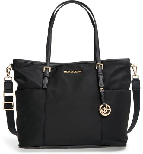 michael michael kors jet set large pocket diaper bag|Michael Kors baby bag.